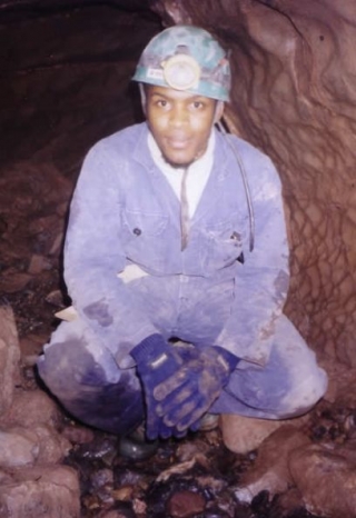 We provide waterproof overalls and a hard hat with headlamp